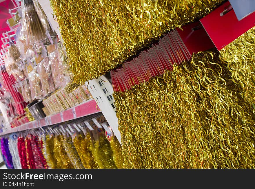 Line of different xmas decor on shelfs in hypermarket. Line of different xmas decor on shelfs in hypermarket