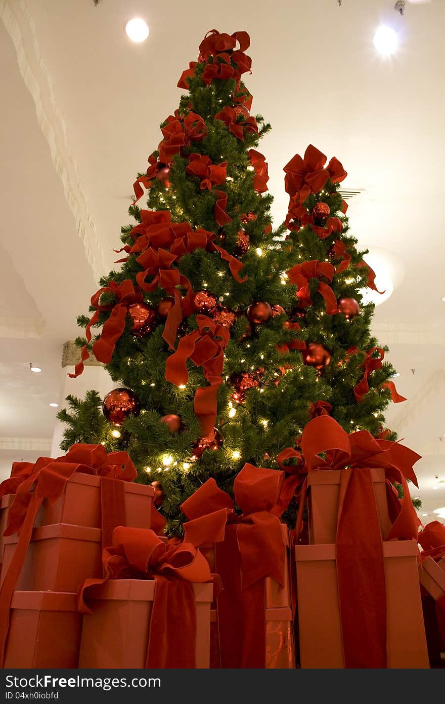 A beautiful Christmas tree with big gift boxes. A beautiful Christmas tree with big gift boxes