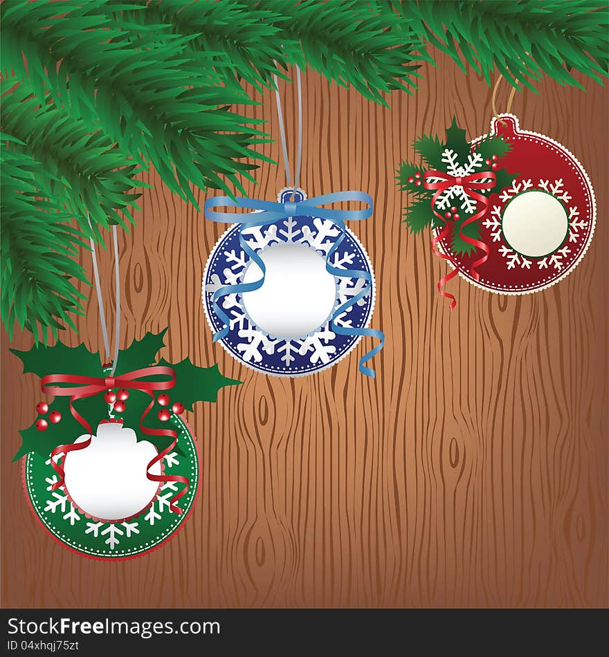 Christmas paper bauble on tree. Wood background. Christmas paper bauble on tree. Wood background