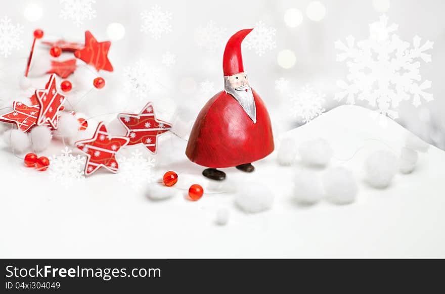 A chubby Santa Claus standing with a stars ribbon around him on white background. A chubby Santa Claus standing with a stars ribbon around him on white background