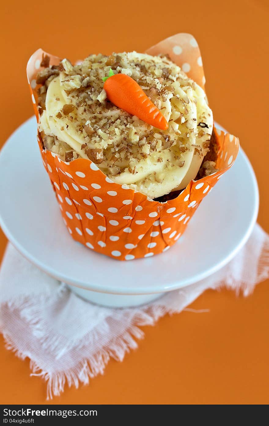 Carrot Cake Cupcake with polka dot wrapper