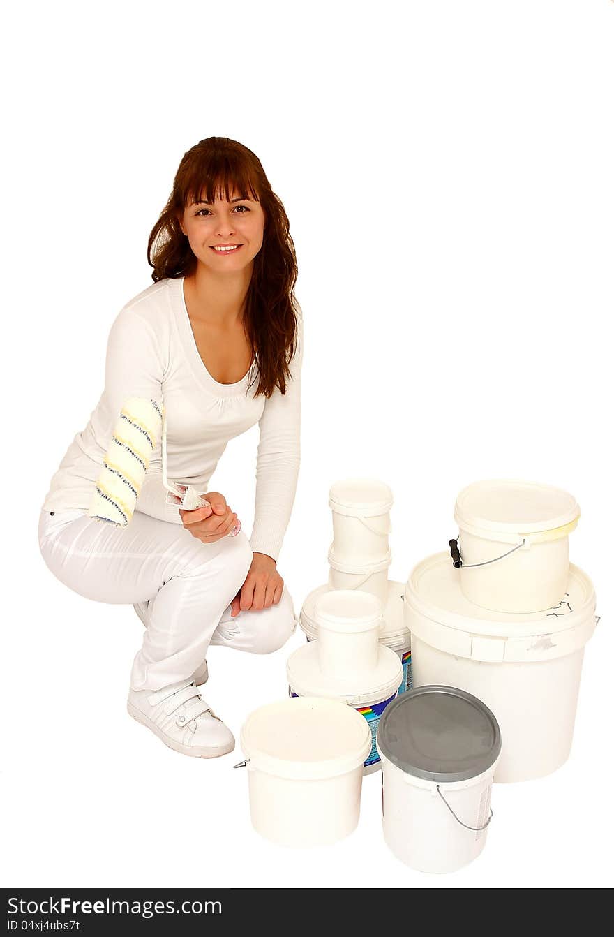 Woman with roller and many plastic container with paint isolated on a white background. Woman with roller and many plastic container with paint isolated on a white background