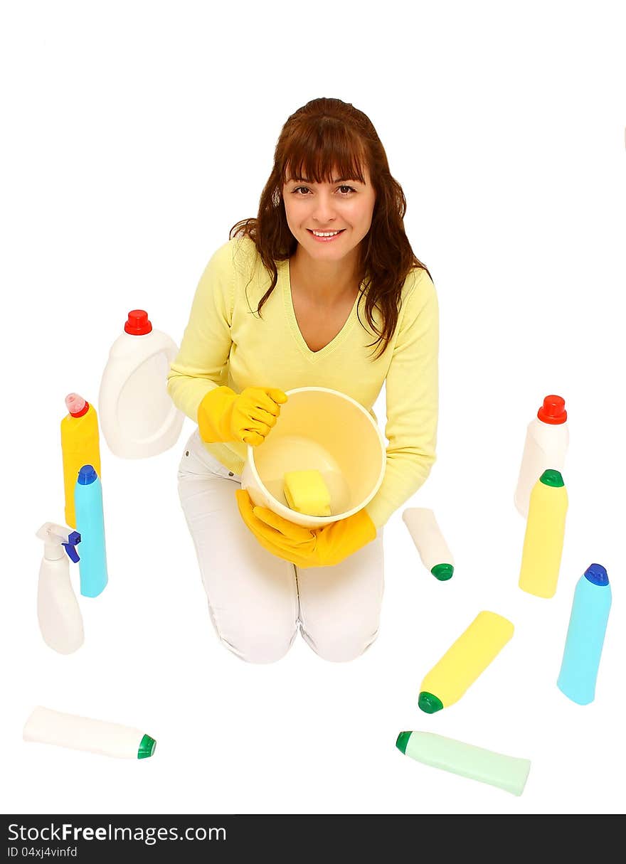 Woman holding plastic bucket with water in it and  many plastic bottles around her isolated on a white background. Woman holding plastic bucket with water in it and  many plastic bottles around her isolated on a white background