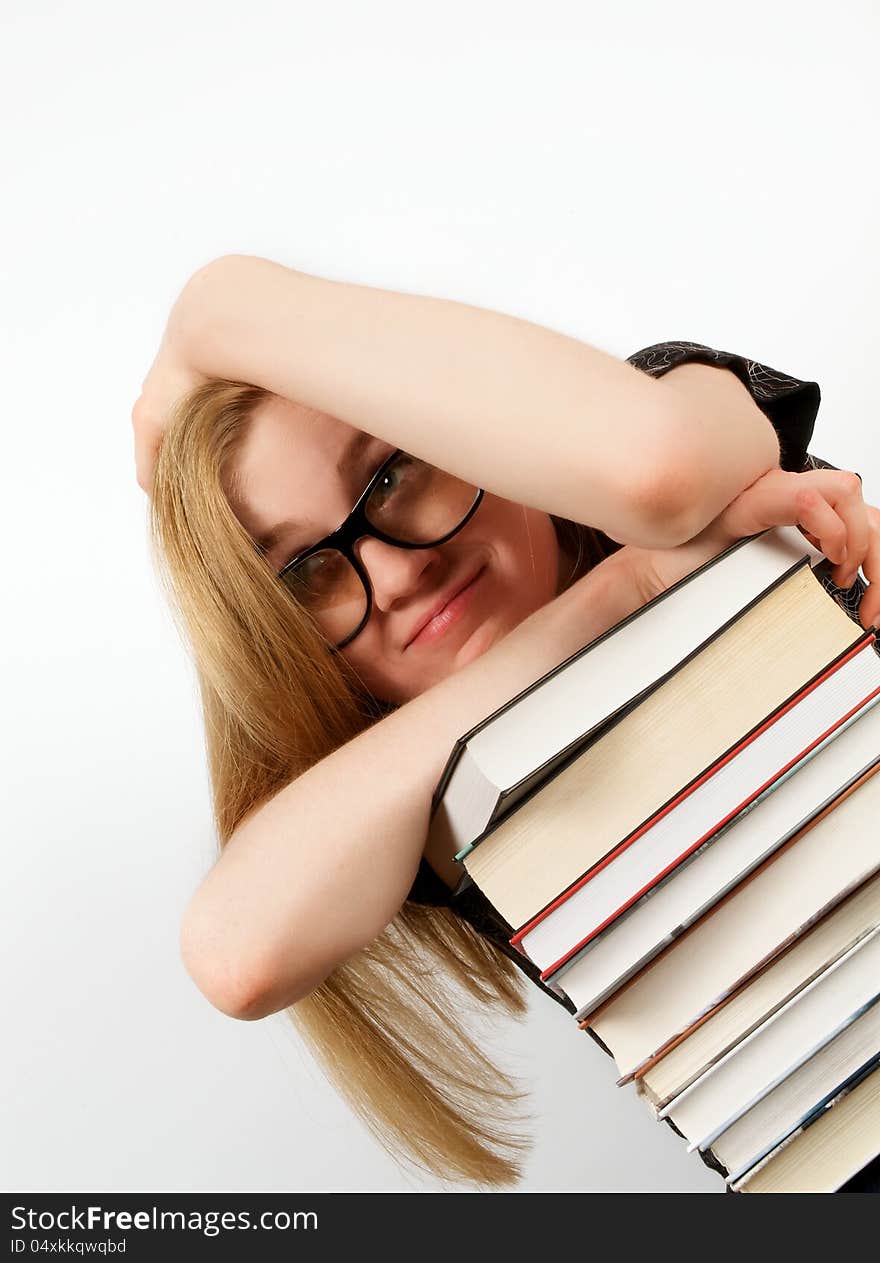 Portrait Of Woman With Stack Of Books