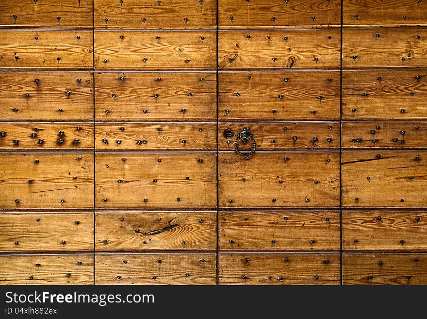 Wooden panels studded with nails