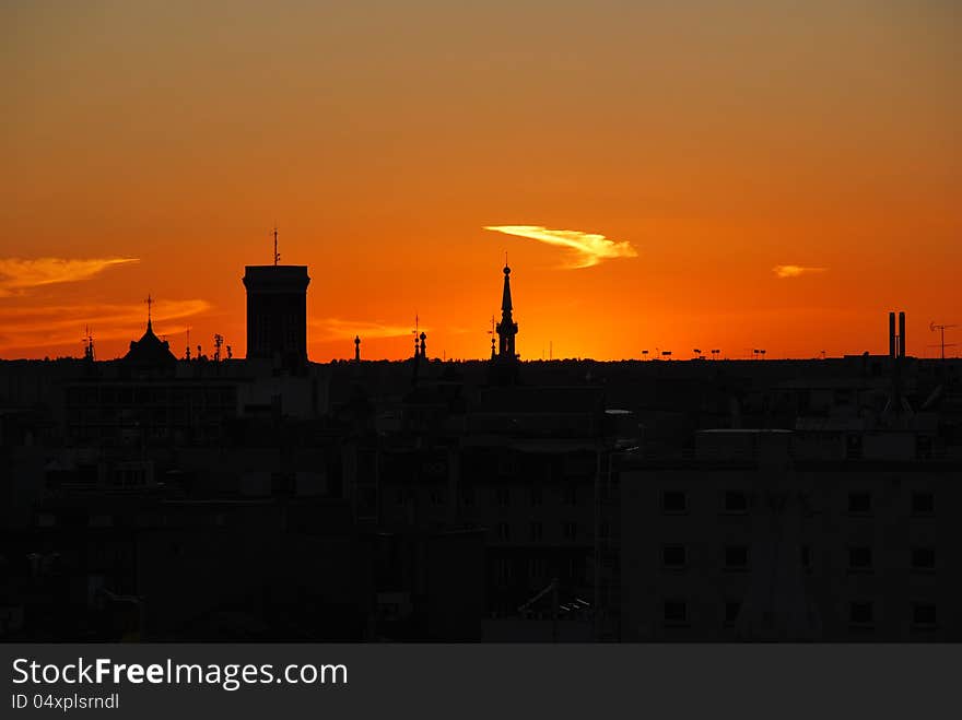 Sunset silhouette of city