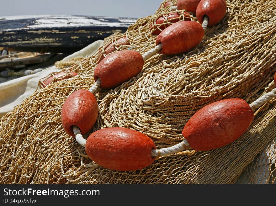 Fishing nets on the waterfront after fishing day - Procida, Naples