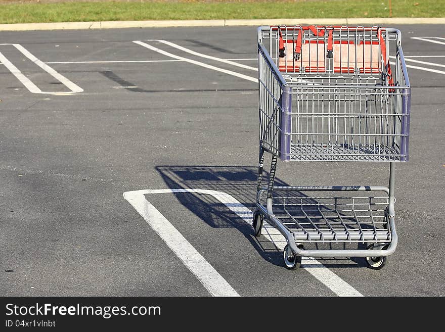 SHOPPING CART TROLLY IN A PARKING LOT