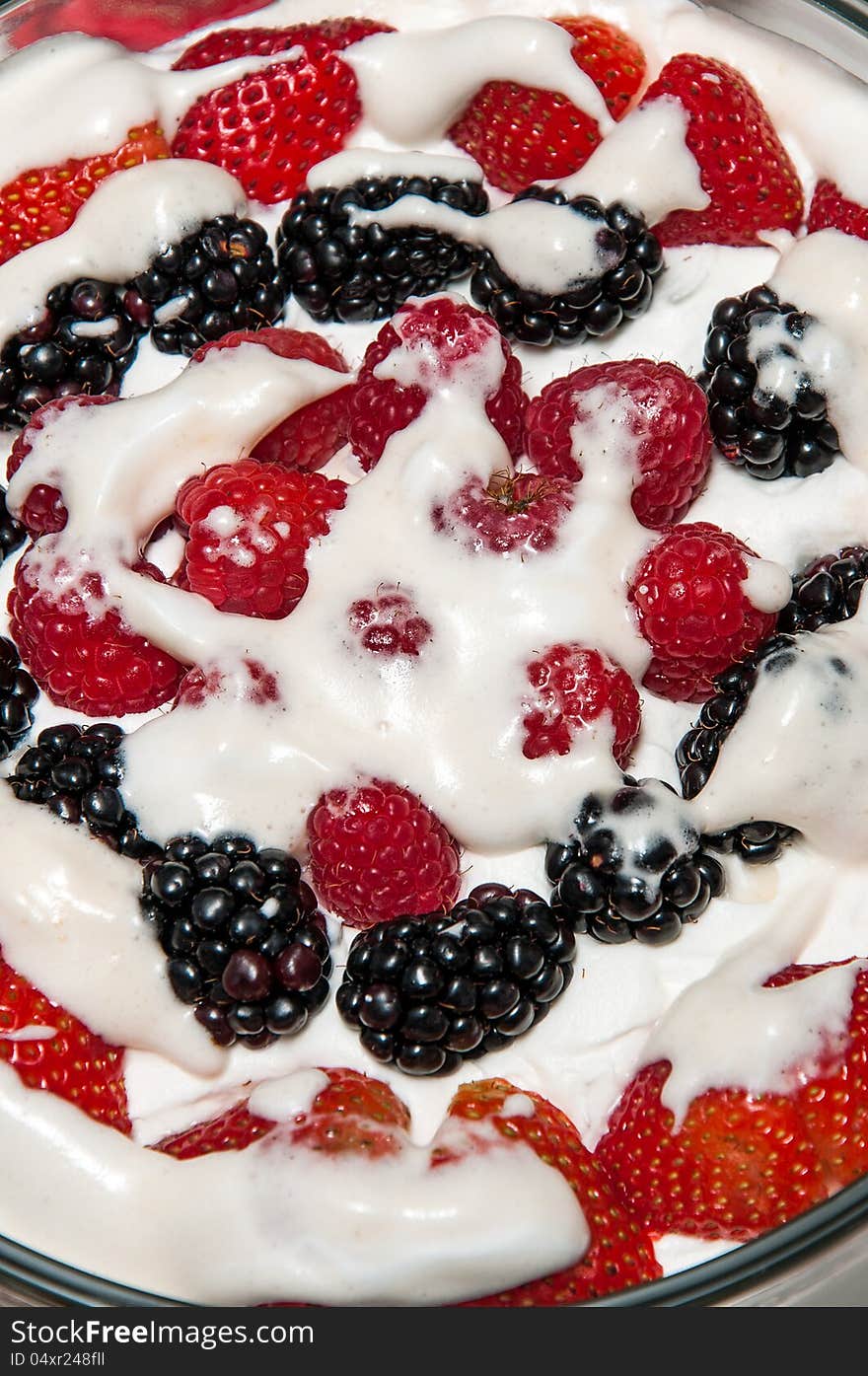 Strawberries, Blackberries and Raspberries in sweet cream sauce. Strawberries, Blackberries and Raspberries in sweet cream sauce.