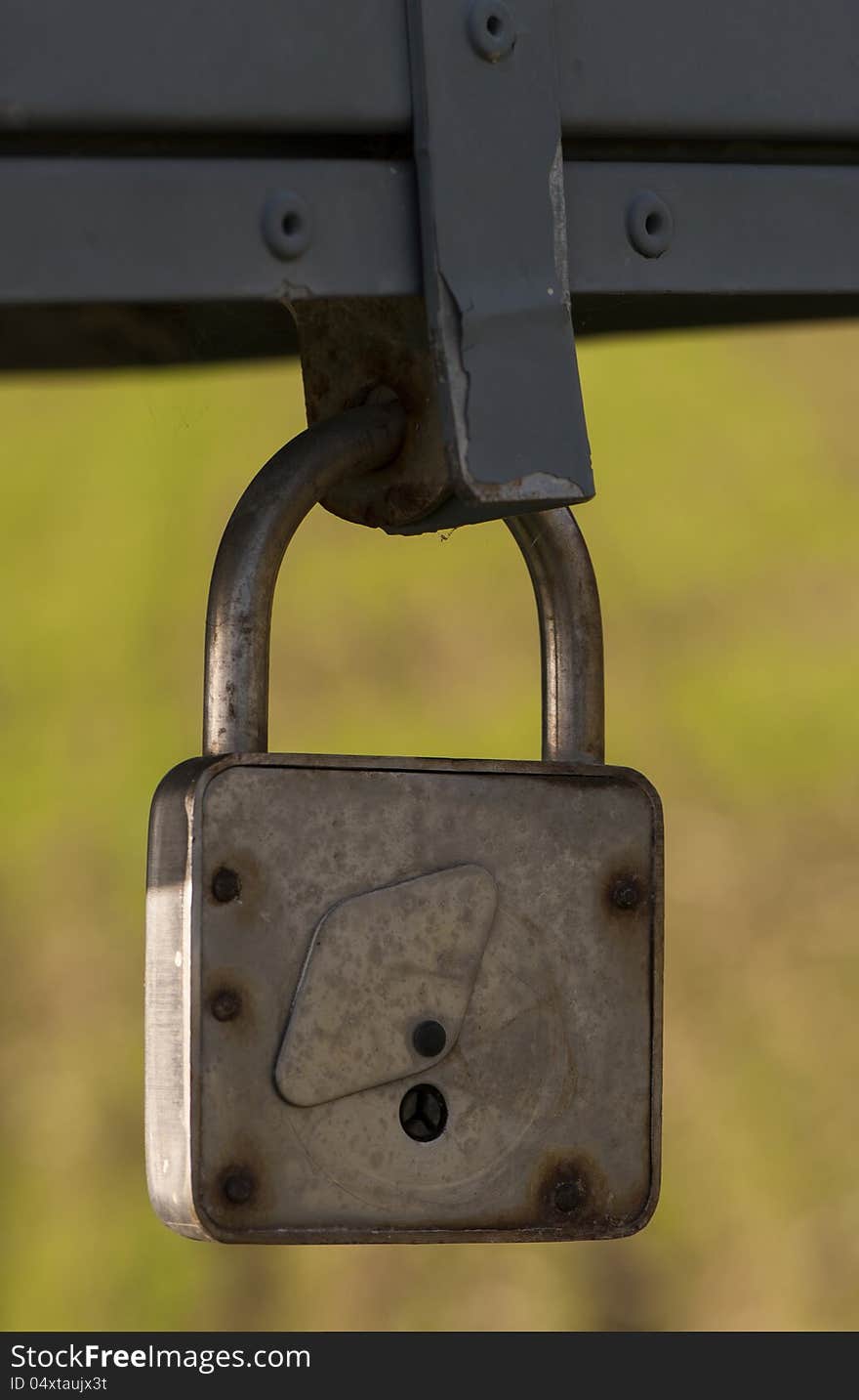 Close-up of an old rusty padlock