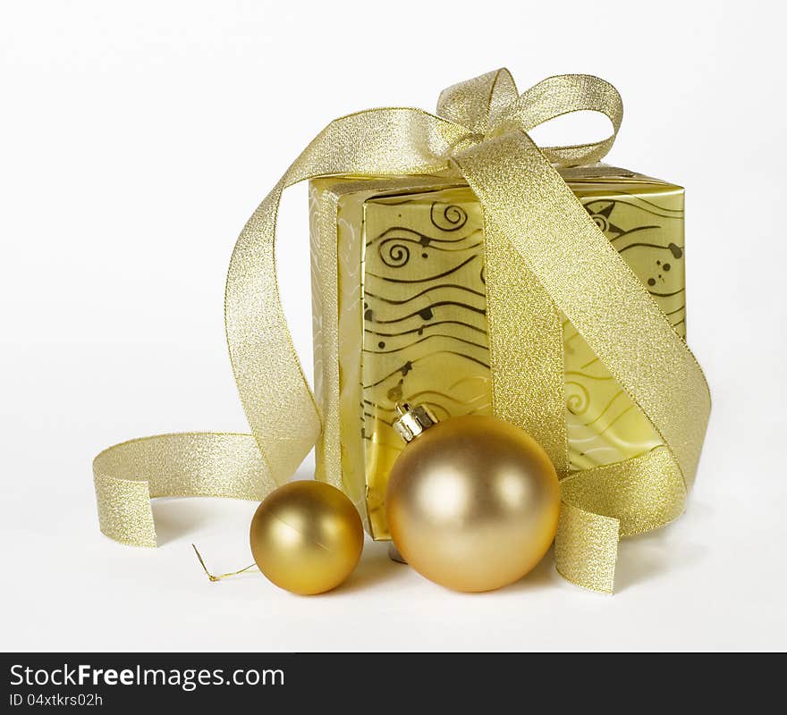 Gifts box with Christmas balls isolated on white