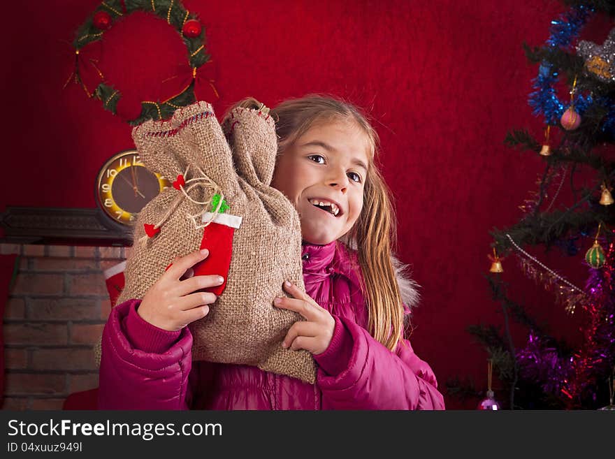 Happy Child With Christmas Gift