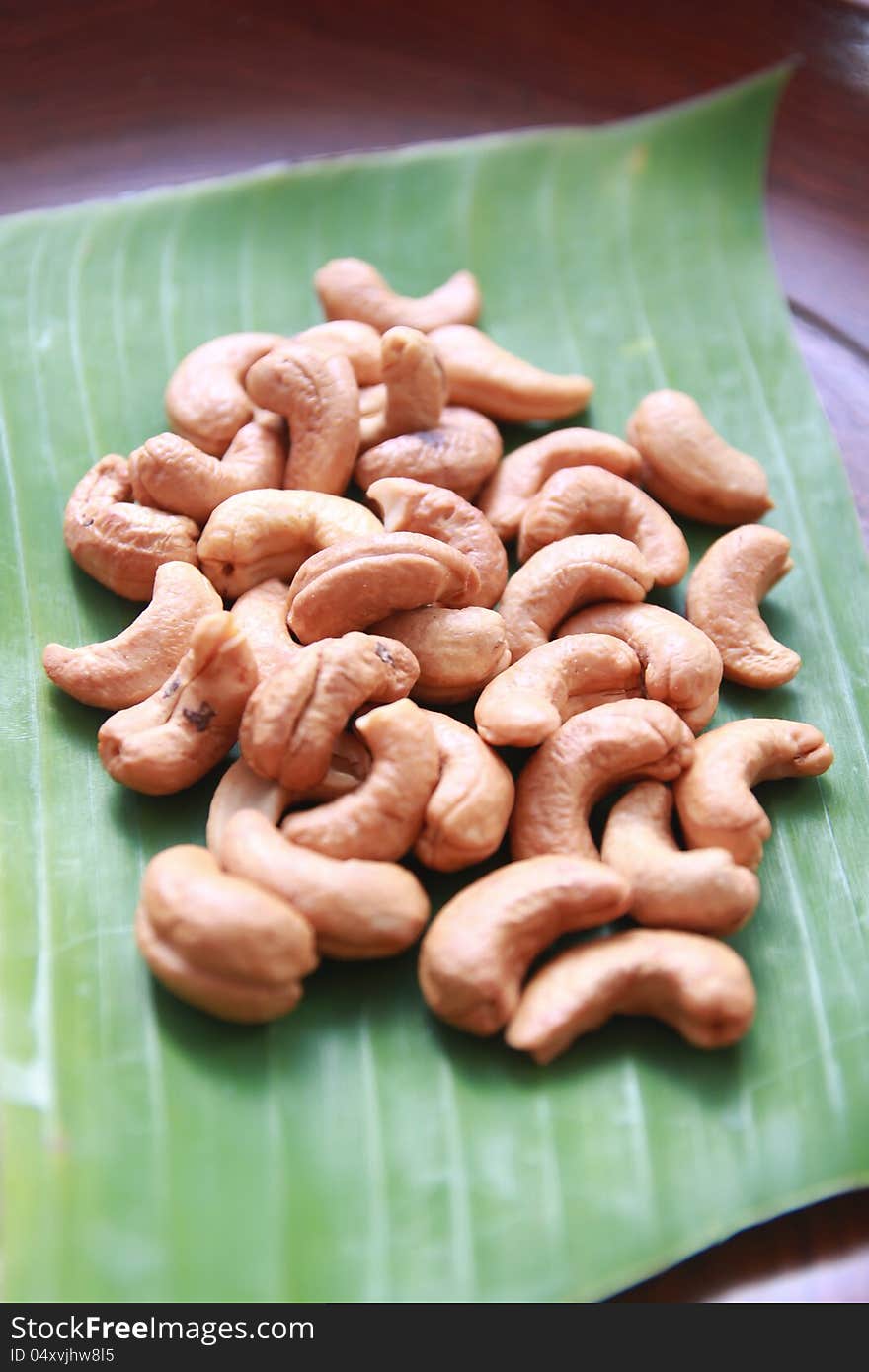 Close up of cashew nuts on banana leaf