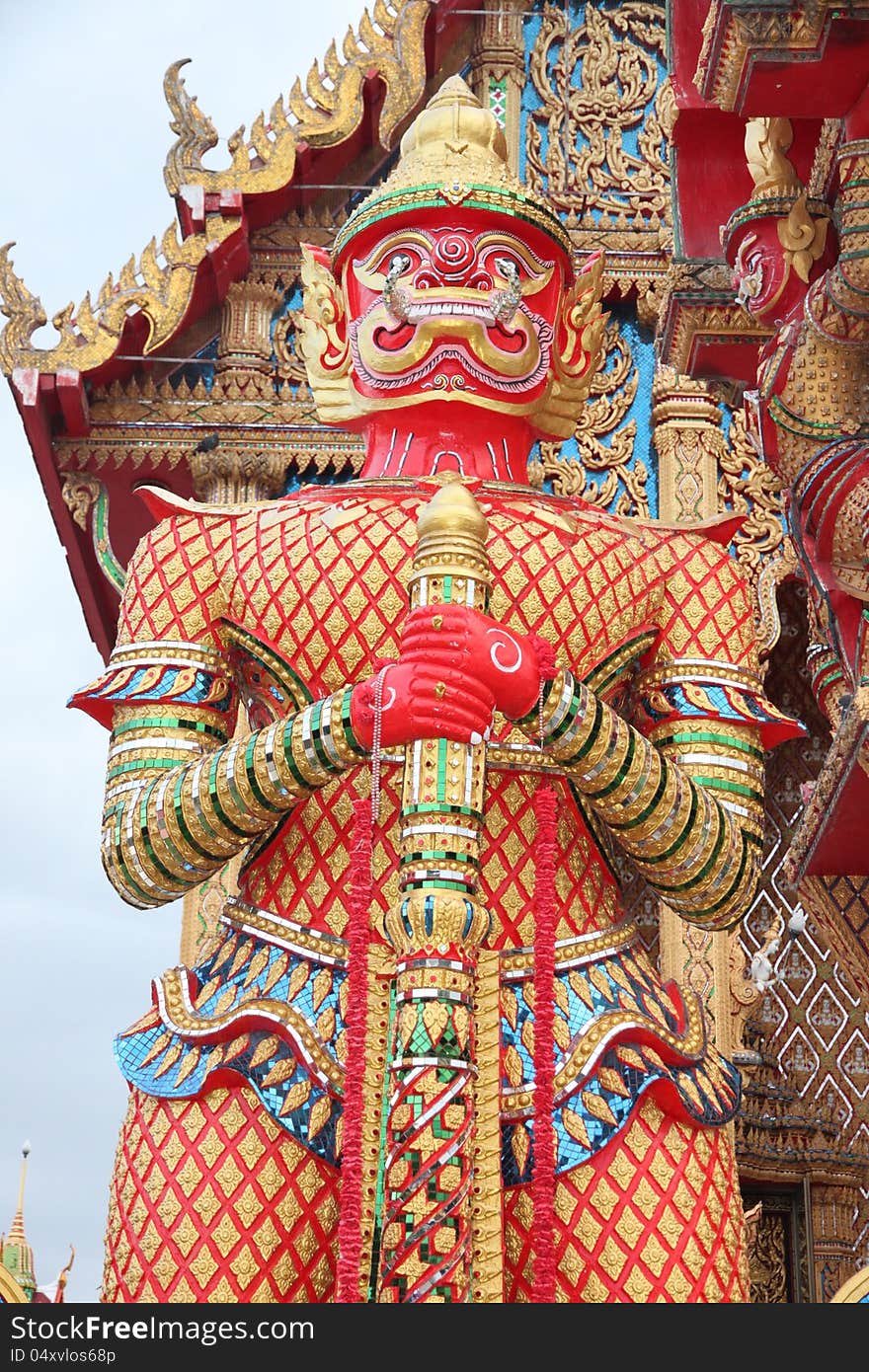 The Red Giant Statue in the Wat Srimahapho,Thailand. The Red Giant Statue in the Wat Srimahapho,Thailand