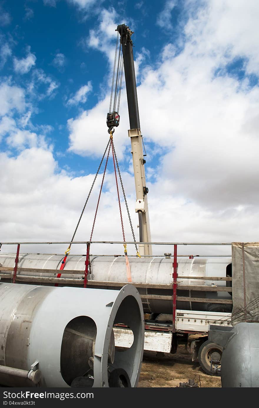 Crane works, equipment unloading by means of the crane, unloading open-air