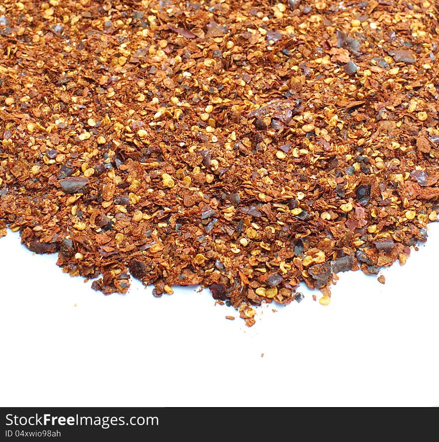 Chili powder isolated on white background