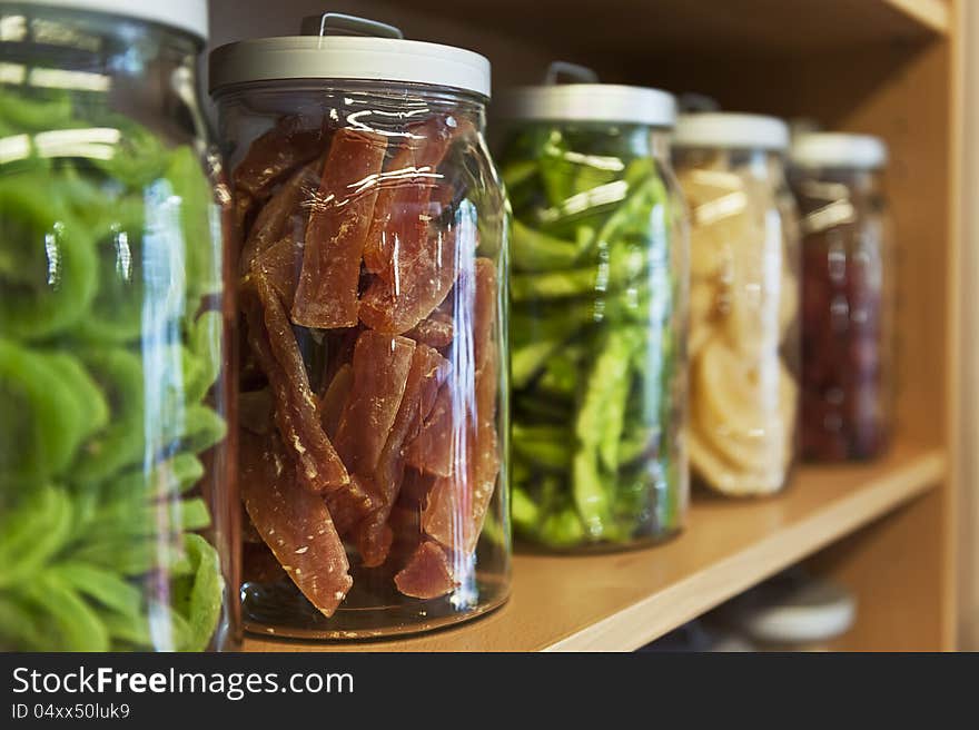 5 jars filled with different food ingredients