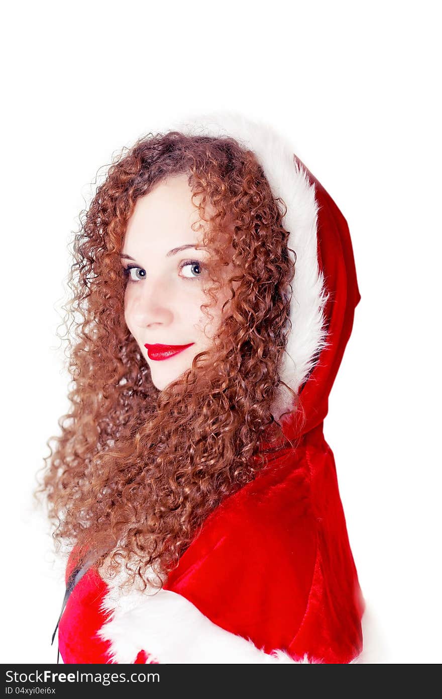 Portrait of cute curly girl dressed as Santa isolated