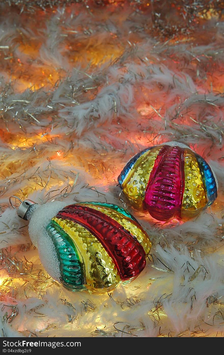 Colored Christmas ornaments on a Christmas tree. Colored Christmas ornaments on a Christmas tree