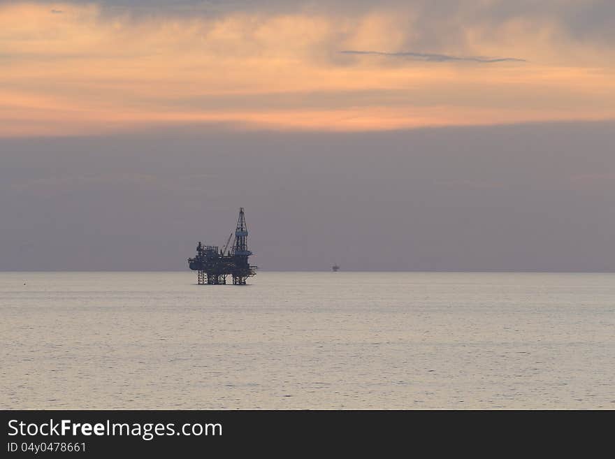 Jack up rig in the middle of the sea