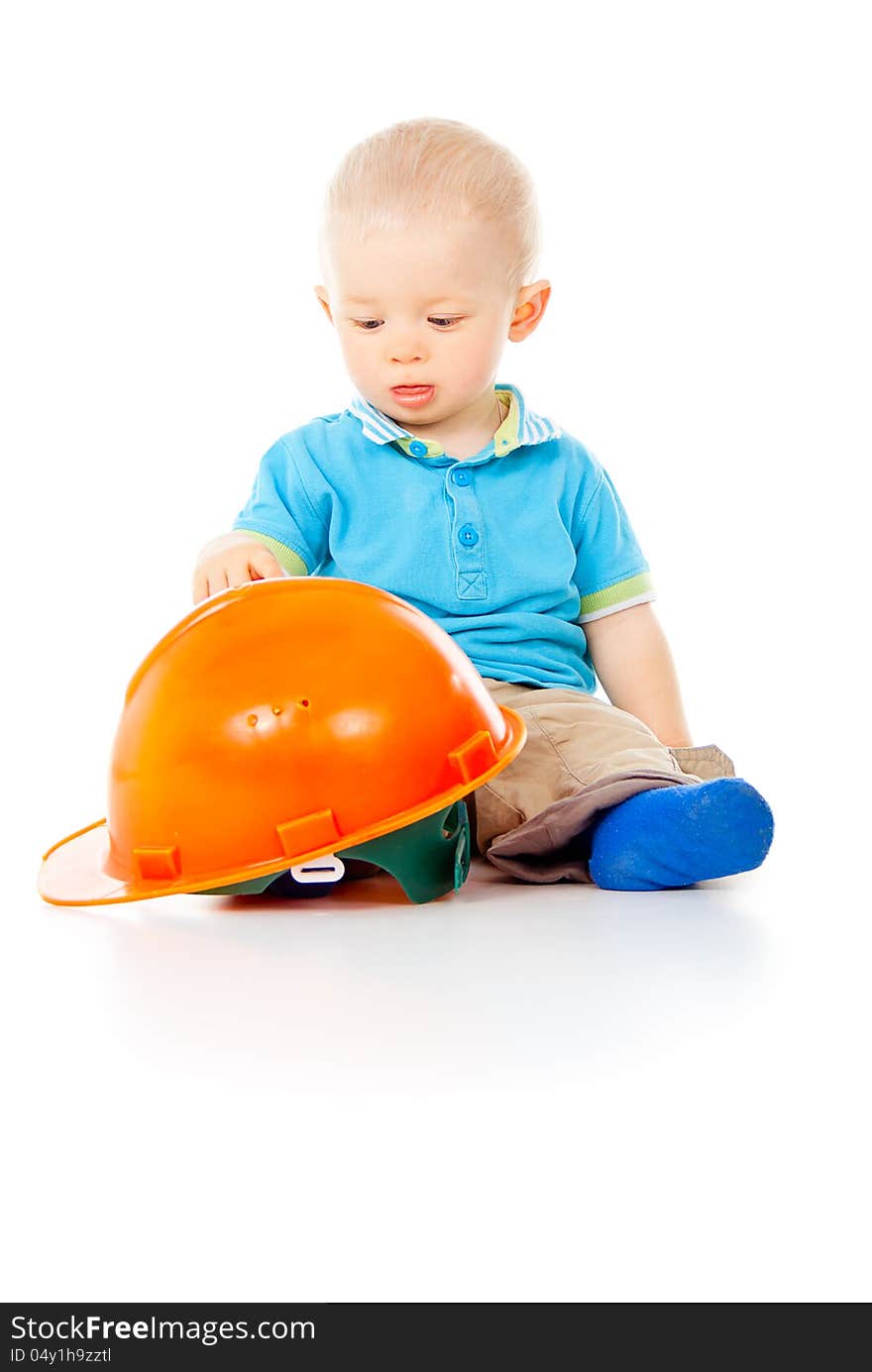 Little boy with construction helmet. Little boy with construction helmet