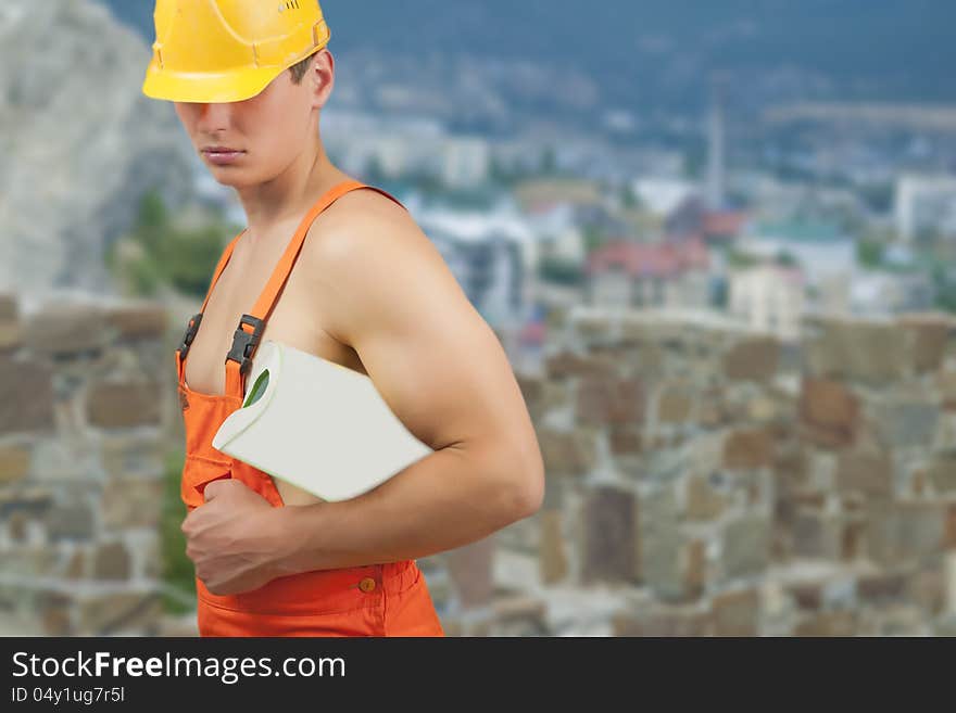 Builder man in protective helmet