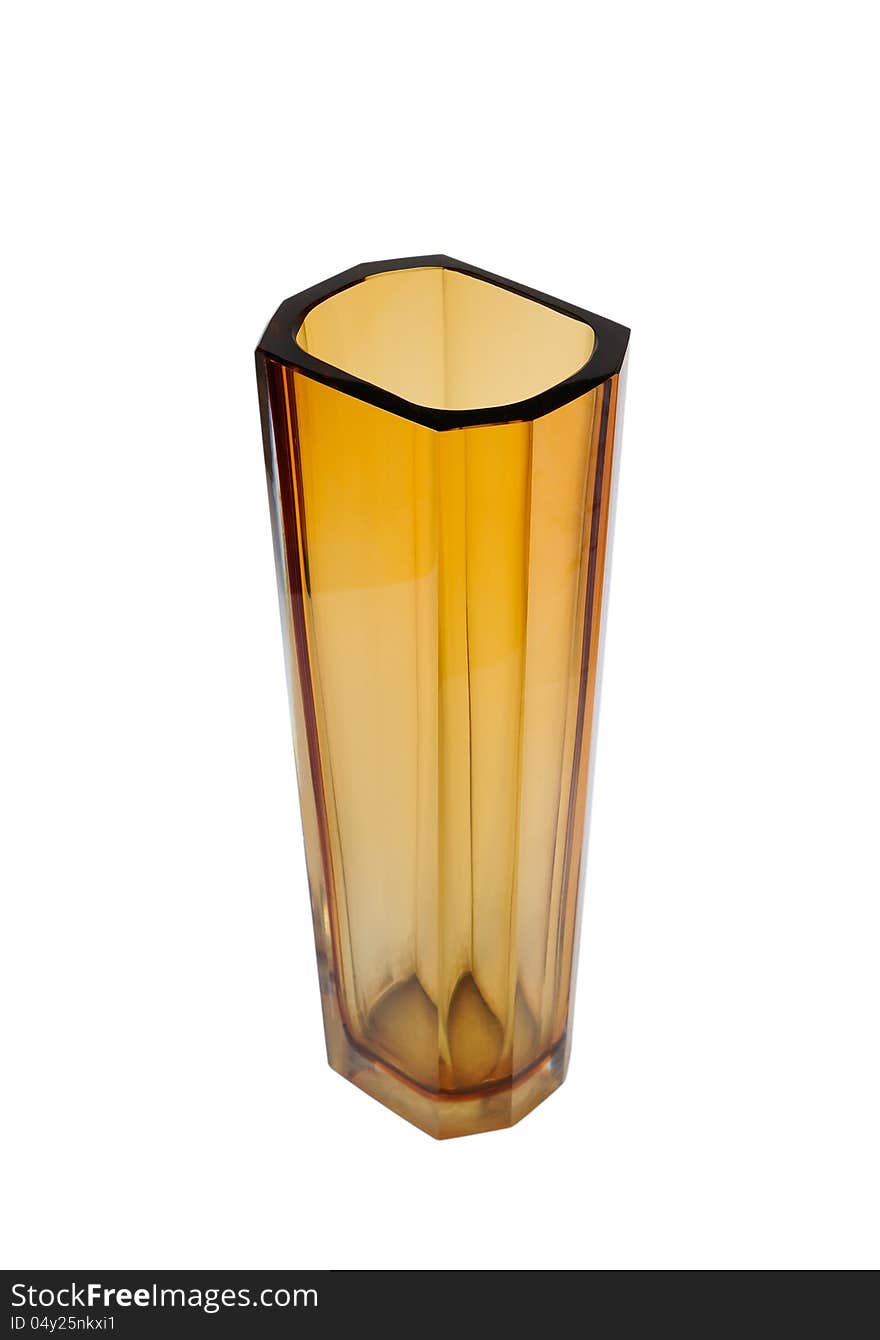 Vase of yellow glass on a white background. Vase of yellow glass on a white background