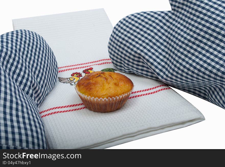 Muffins with gloves on a white backgroud