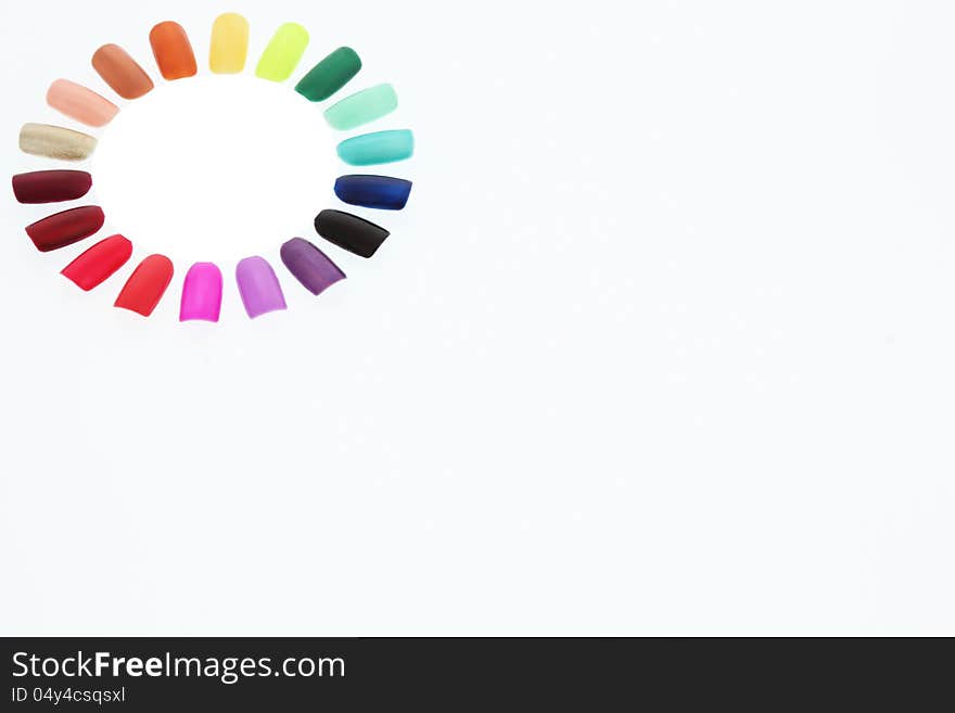 Nail polish rainbow on white background