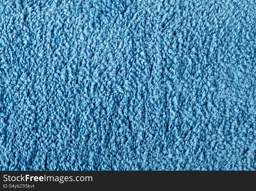 Blue towel or cleaning cloth texture close up. Blue towel or cleaning cloth texture close up