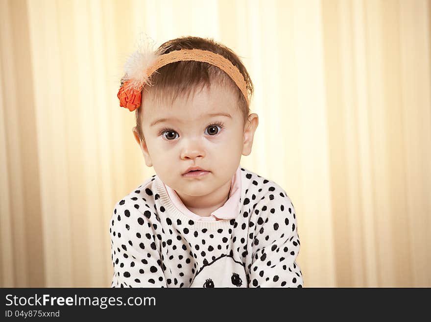 White infant girl posing in studio. White infant girl posing in studio