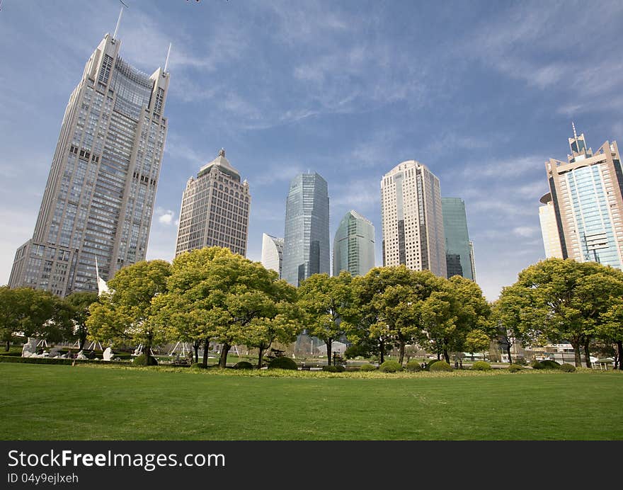 Shanghai Lujiazui Financial Center buildings surrounded by blue sky shade. Shanghai Lujiazui Financial Center buildings surrounded by blue sky shade