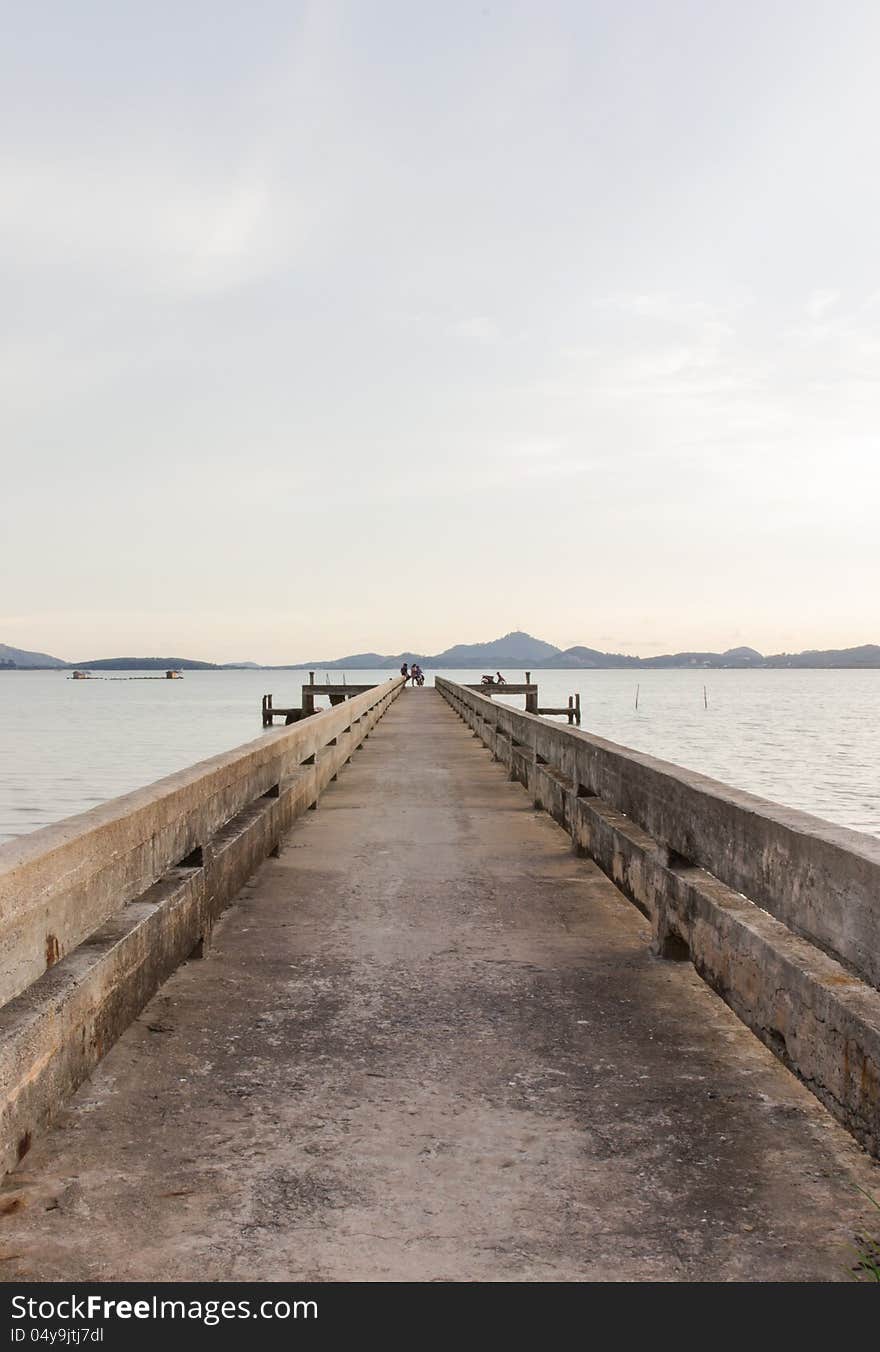 Very old concrete pier in the evening, Yamu bay, Phuket, Thailand