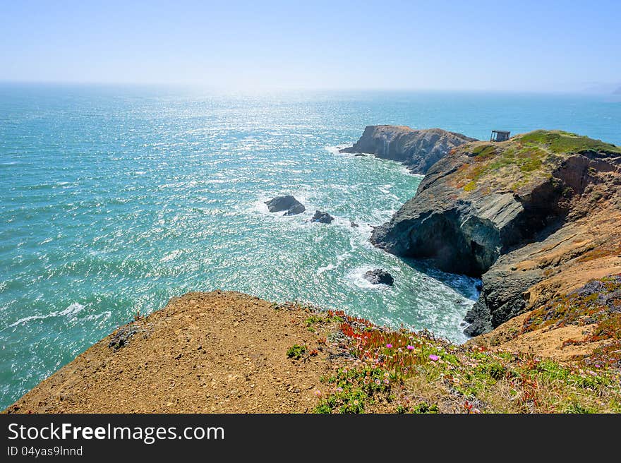 Rocky Californian shore in the light of sun