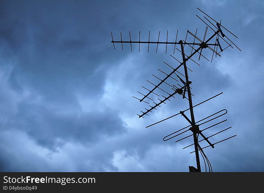 Silhouette of antenna before the storm. Silhouette of antenna before the storm