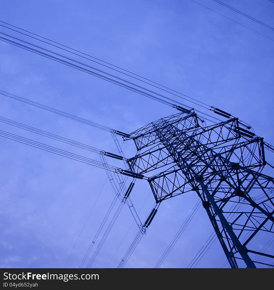 Electricity tower in the blue sky and white clouds. Electricity tower in the blue sky and white clouds