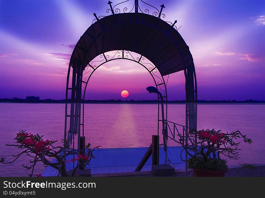 Arch of sunset over the Mekong river. View from Thakhek, Laos.