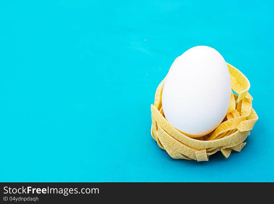 Italian pasta nest with egg