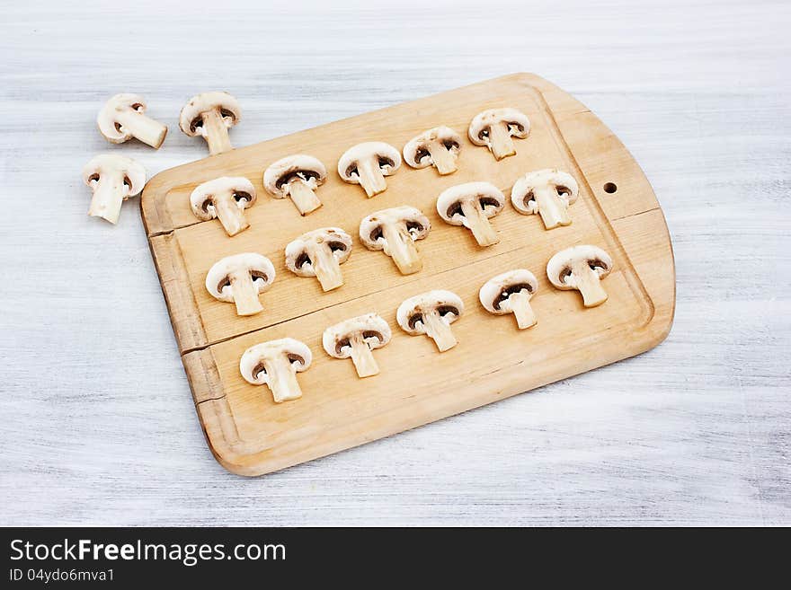 Mushrooms On Cutting Board