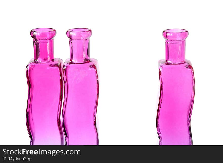 Three glass vases on a white background