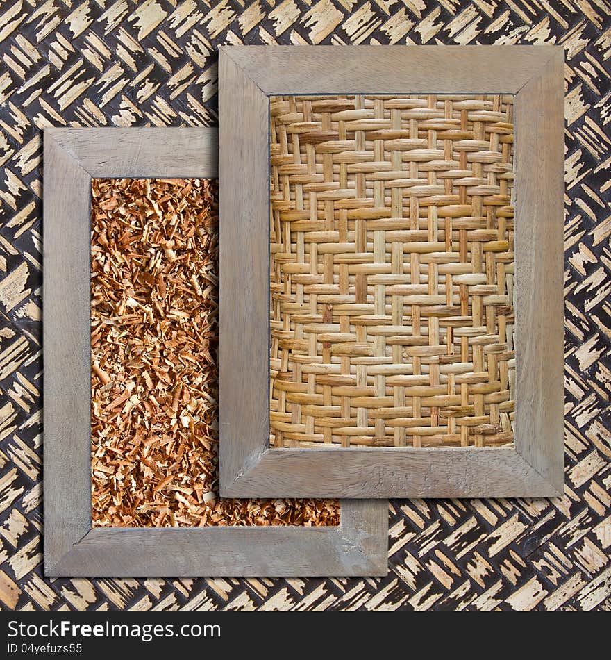 Woven with bamboo sawdust in wooden frames on a bamboo background. Woven with bamboo sawdust in wooden frames on a bamboo background.