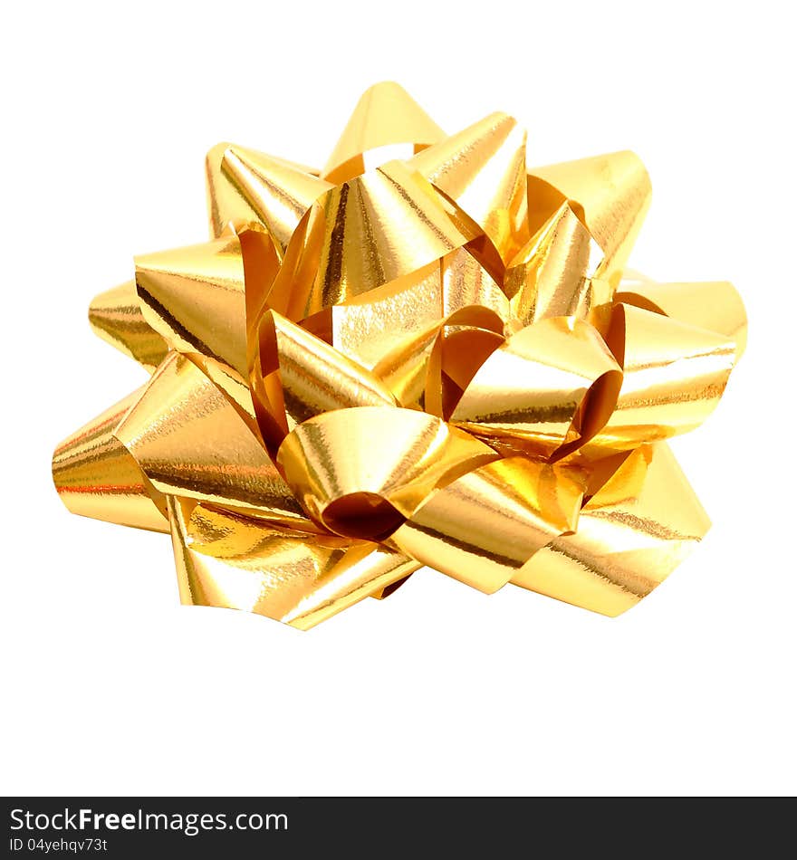 Golden gift bow isolated on pure white background with clipping path. Golden gift bow isolated on pure white background with clipping path