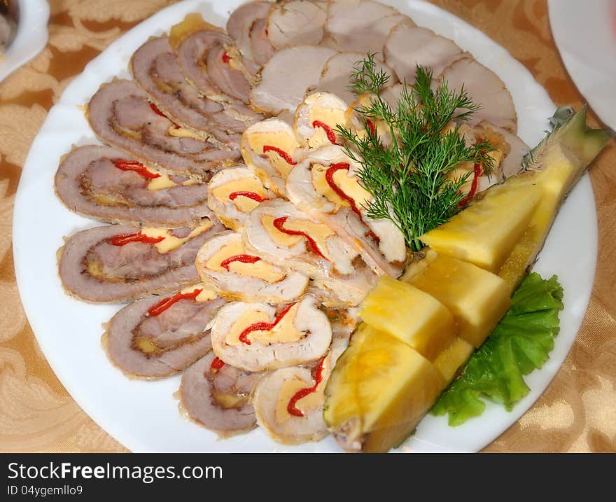 Slices Of Meat Decorated With Greens