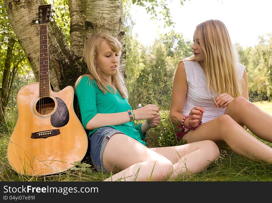 Two girls are having fun in the summer sun. Two girls are having fun in the summer sun