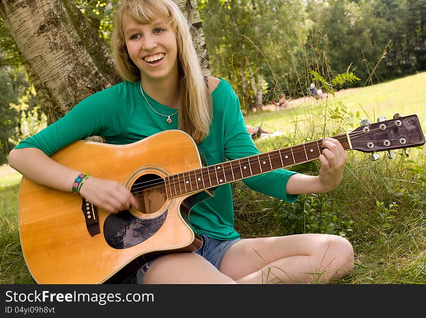 Blond girl and her instrument