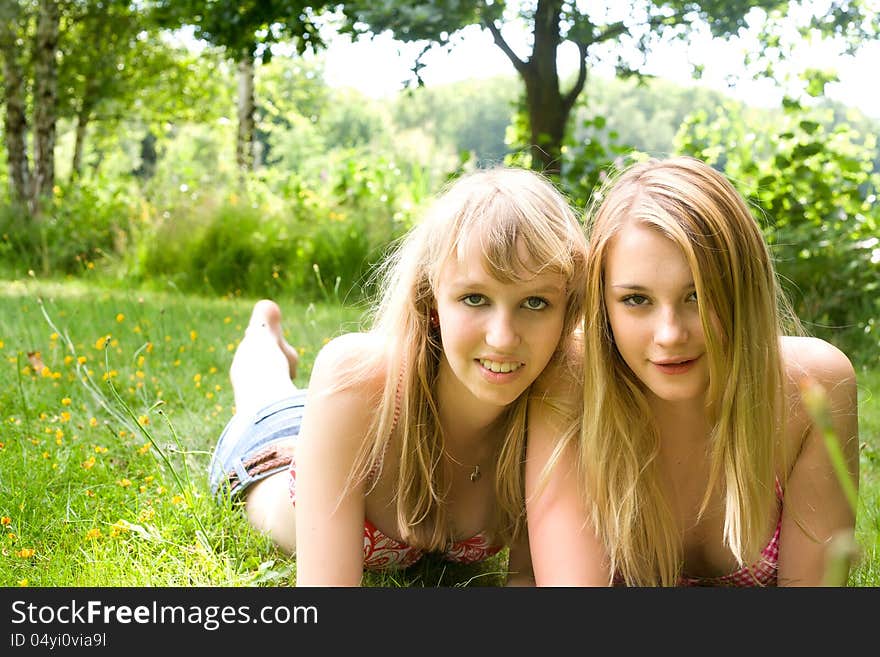 Two girls are having fun in the summer sun. Two girls are having fun in the summer sun