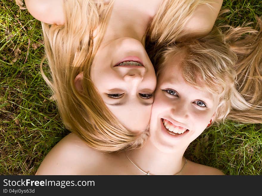 Two girls are having fun in the summer sun. Two girls are having fun in the summer sun