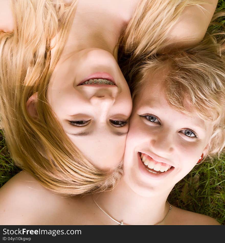 Two girls are having fun in the summer sun. Two girls are having fun in the summer sun