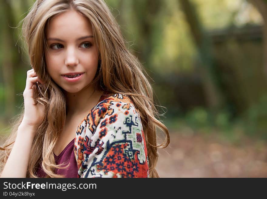 2 girls are having fun in the forest. 2 girls are having fun in the forest