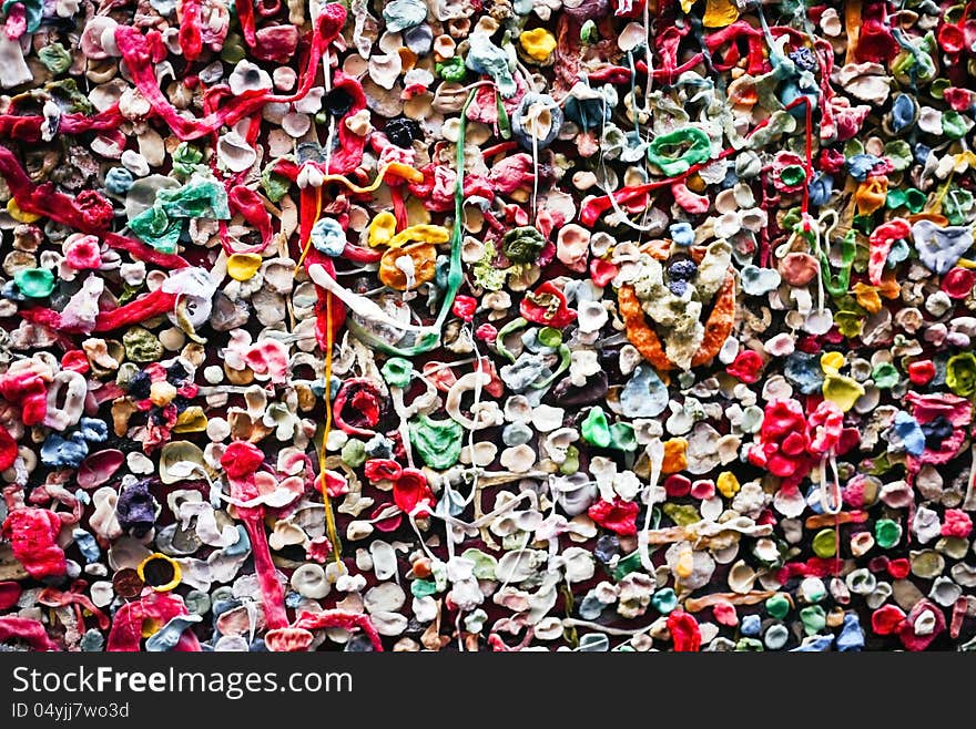 Up close shot of the infamous gum wall and it's thousands of colorful gum wads. Up close shot of the infamous gum wall and it's thousands of colorful gum wads.